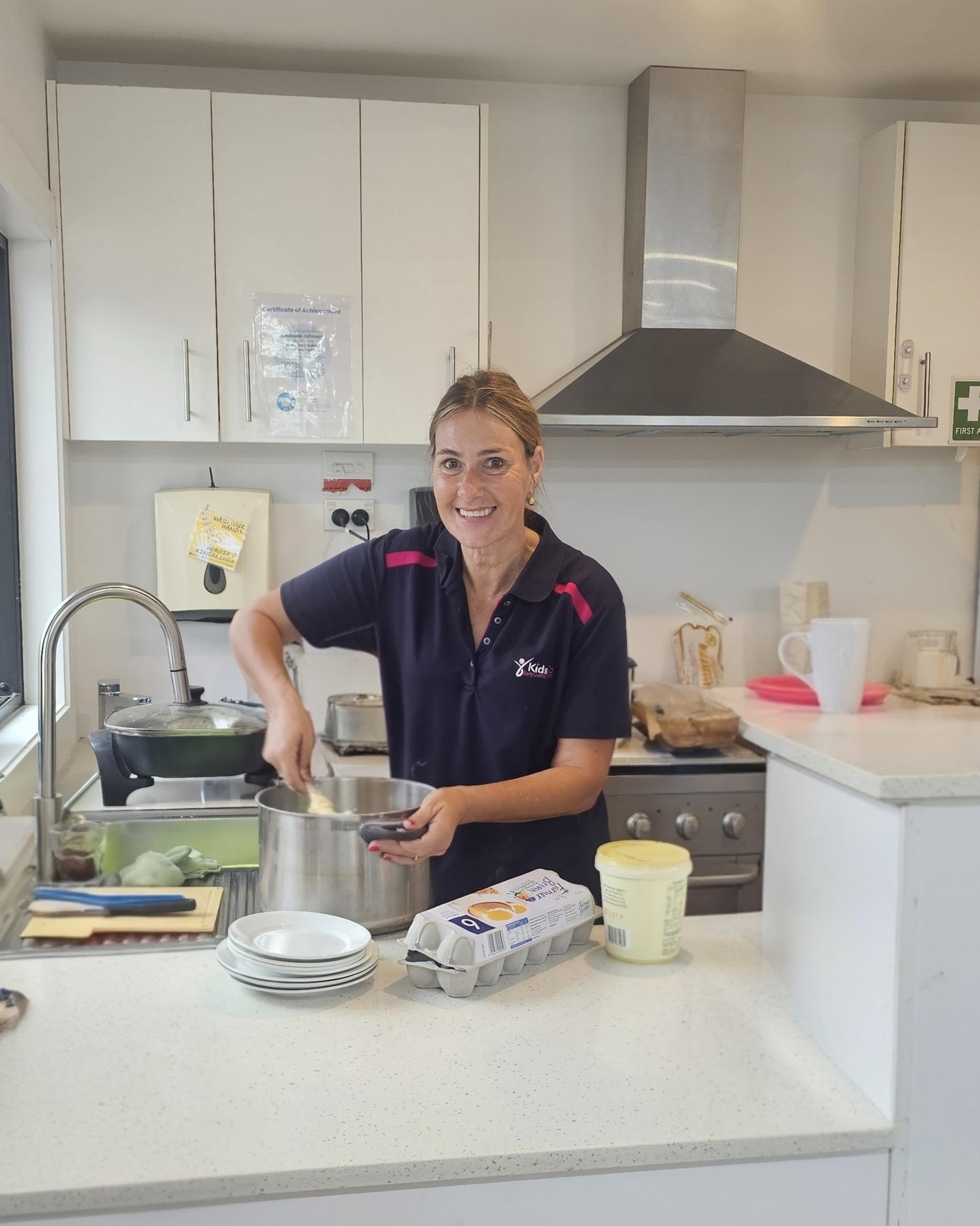 KIdsCo Birkenhead childcare cook preparing a delicious meal