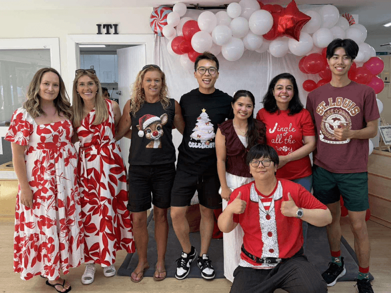 The KidsCo Birkenhead teaching team together at a Christmas celebration.